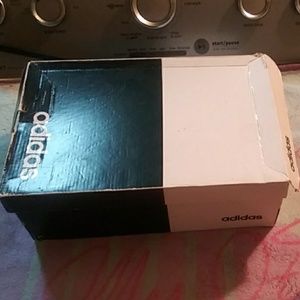 Girl Gold and White Adidas Sneakers